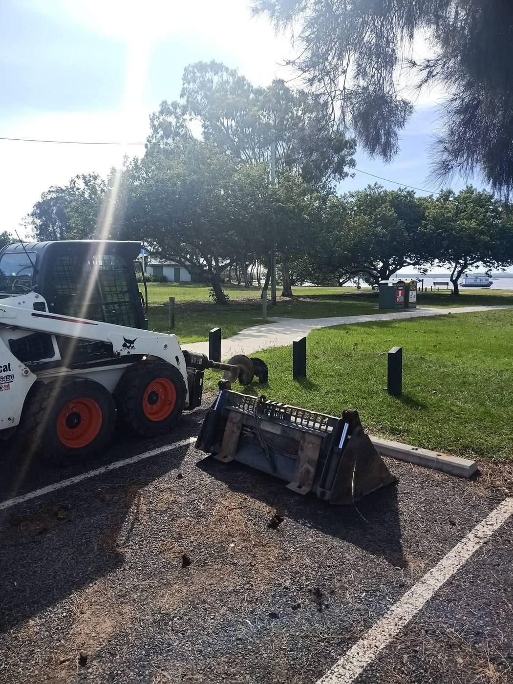 JRB bobcat with bucket on a site preparation job